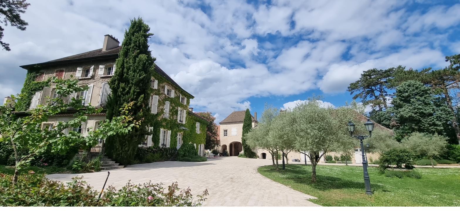 The château at Mirande, its courtyard and tower on a summer afternoon.